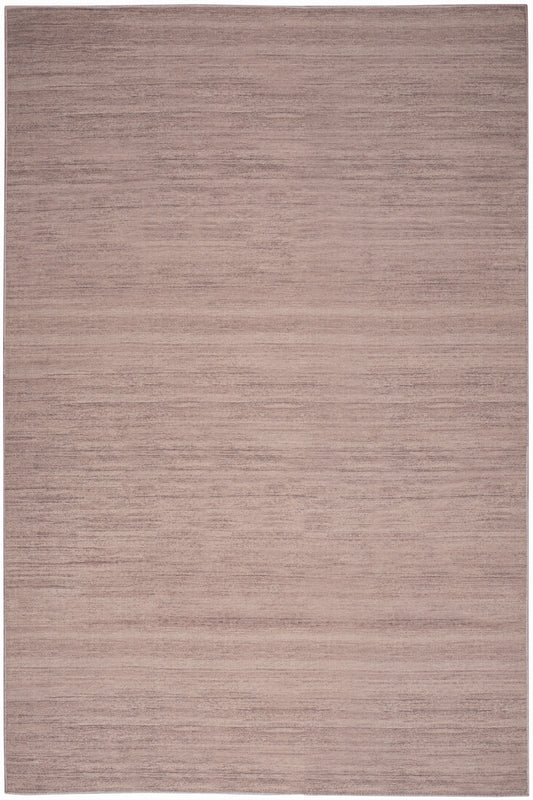 Soft pink-beige woven rug with subtle horizontal texture and warm neutral tone.