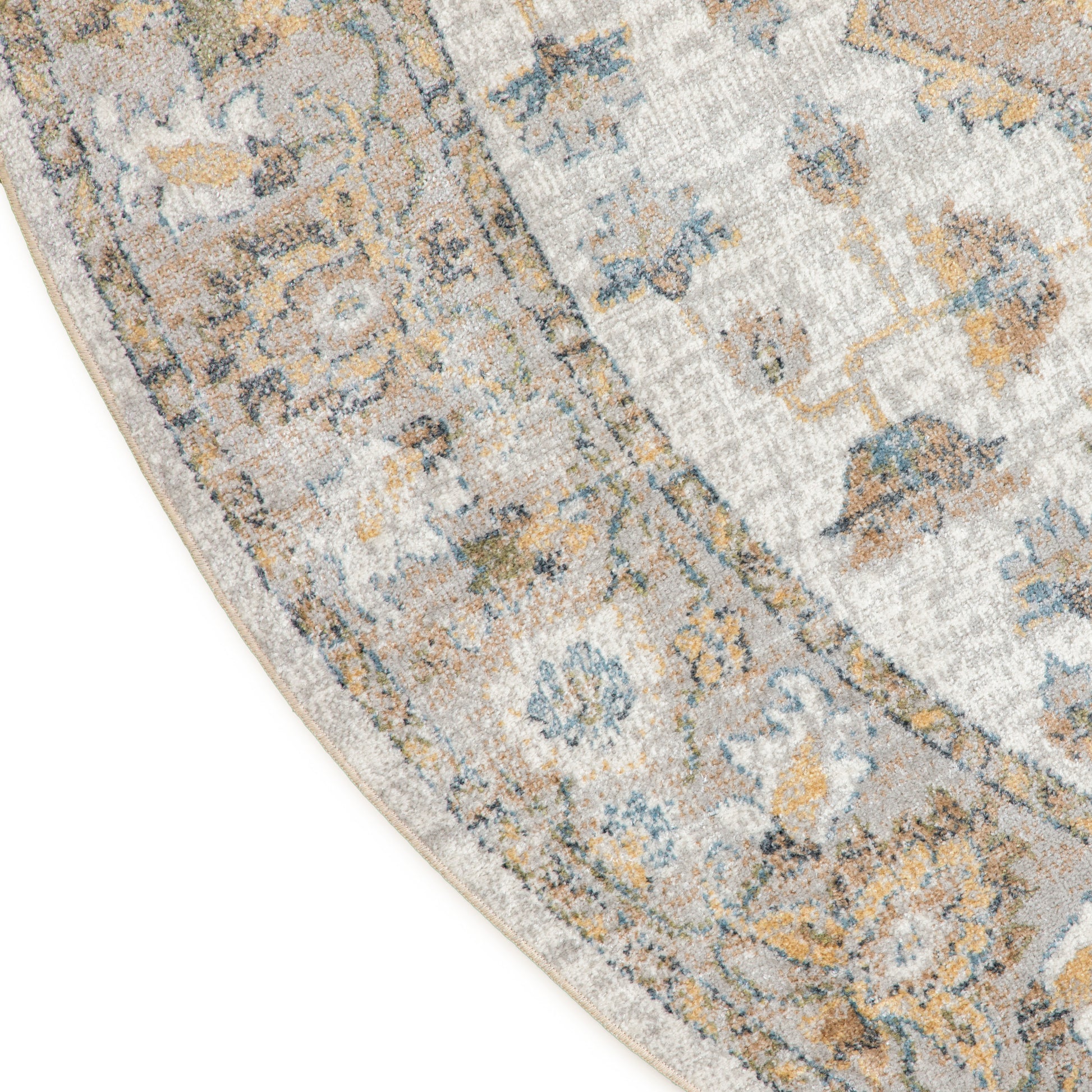 Round rug with ivory and beige background, blue and gold floral motifs, vintage Persian-inspired distressed style.