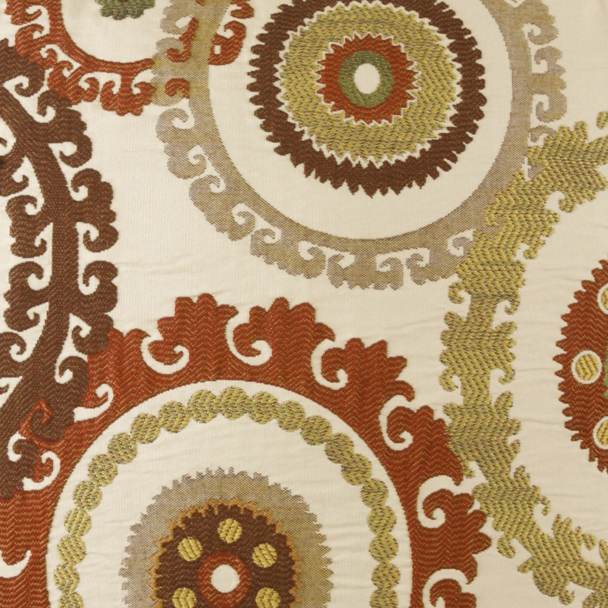 Cream fabric with large circular medallions in orange, brown, olive and gold, intricate ornamental scrollwork.