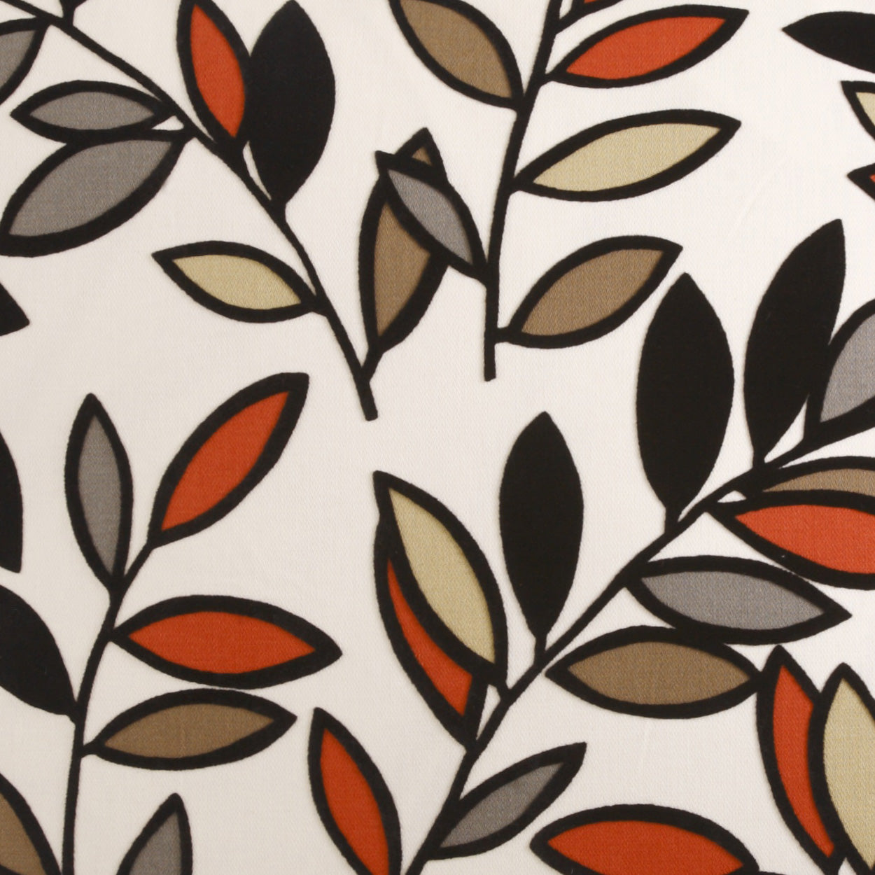 Fabric with a stylized leafy vine pattern in black stems and orange, tan, and gray leaves on ivory.