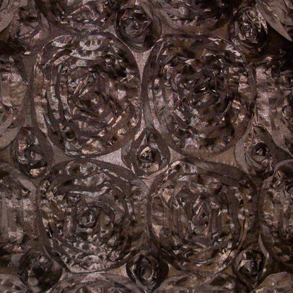 Brown textured pillow featuring a repeating embossed rose rosette motif and subtle sheen, 24" x 24".