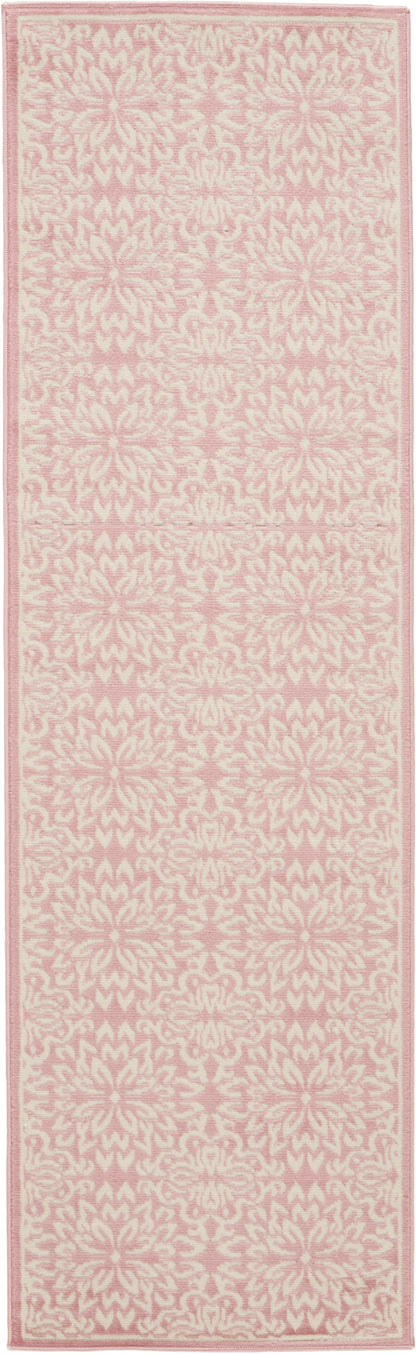 Pink and cream damask patterned rug runner with pale border, soft woven texture.