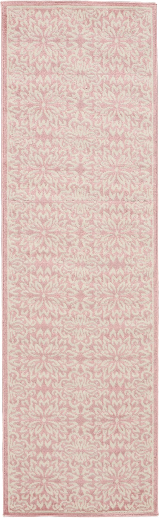Pink and cream damask patterned rug runner with pale border, soft woven texture.