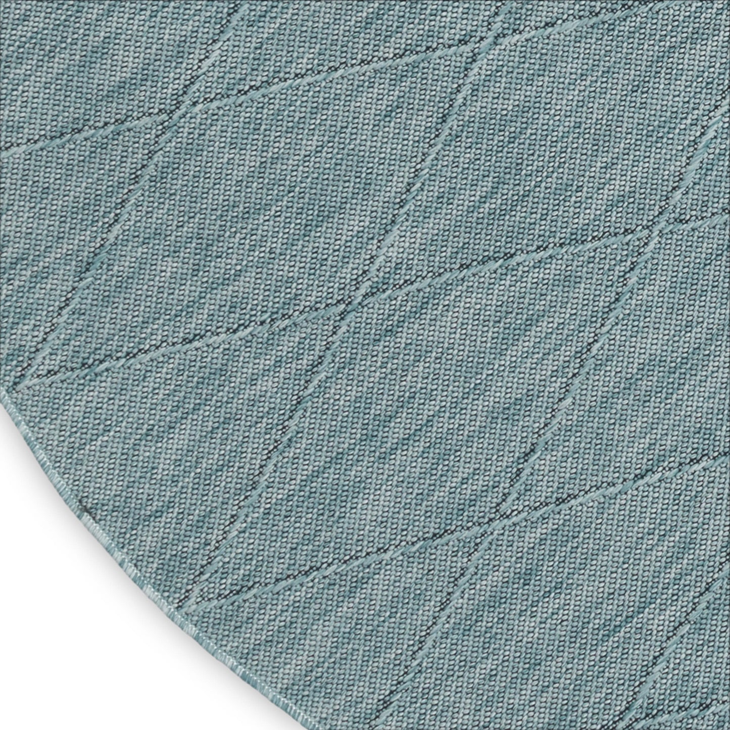 Light blue denim-textured round rug with diagonal diamond quilt stitching, 8' diameter.