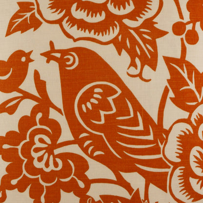 Orange bird and floral pattern on cream pillow fabric; bold, stylized bird among large blossoms and leaves.