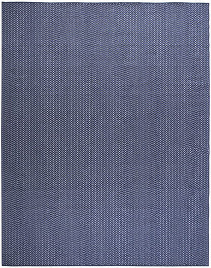 Blue woven rug with navy and light-blue chevron pattern; rectangular floor rug.