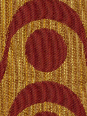 Gold woven fabric with large red circular rings and a central dot; retro geometric upholstery textile.