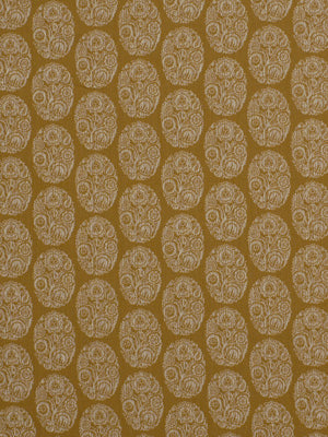 Repeating gold cameo-scroll motif with ornate filigree on a warm goldenrod background; upholstery fabric pattern