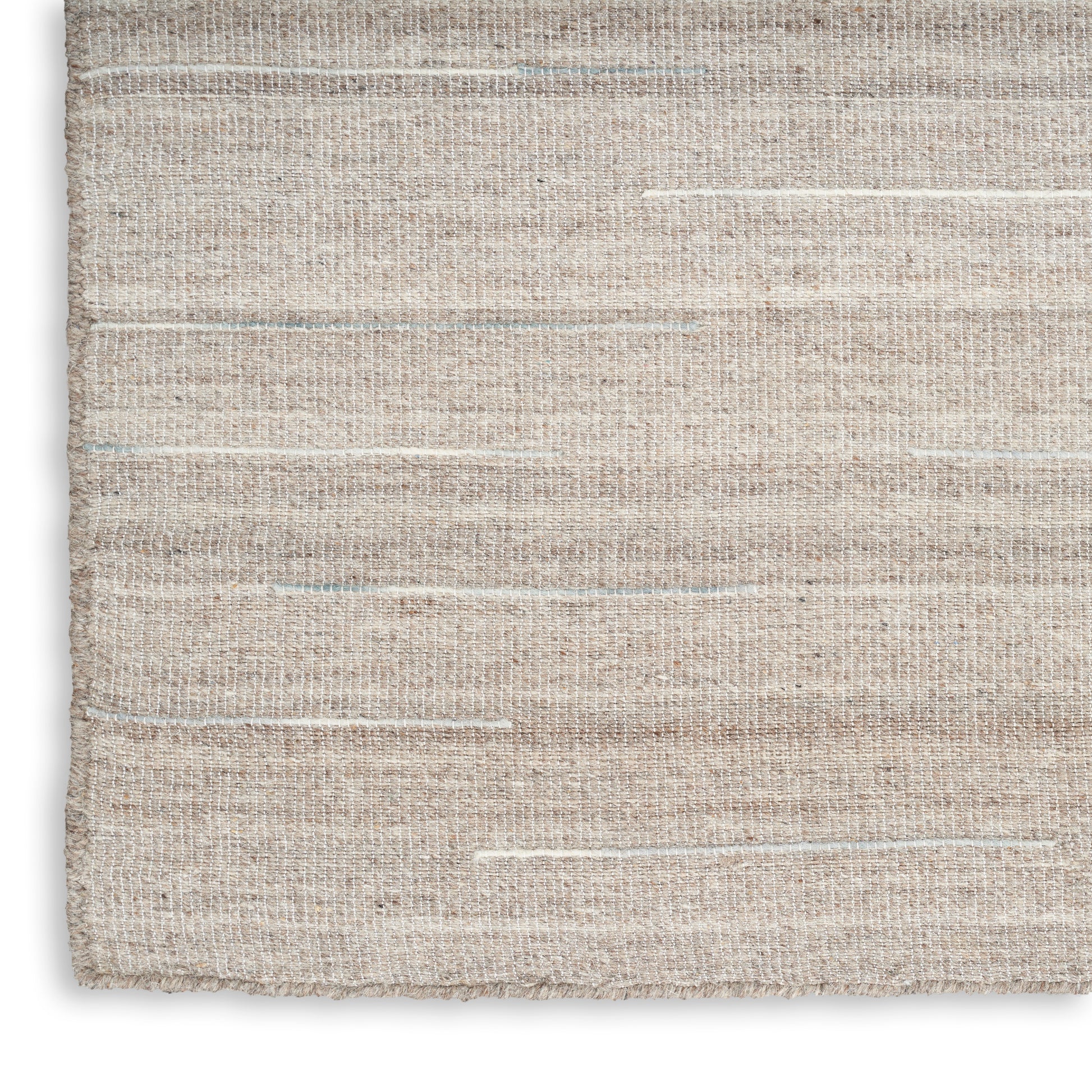 Beige natural jute rug with flatweave texture and faint cream and pale blue horizontal stripes.
