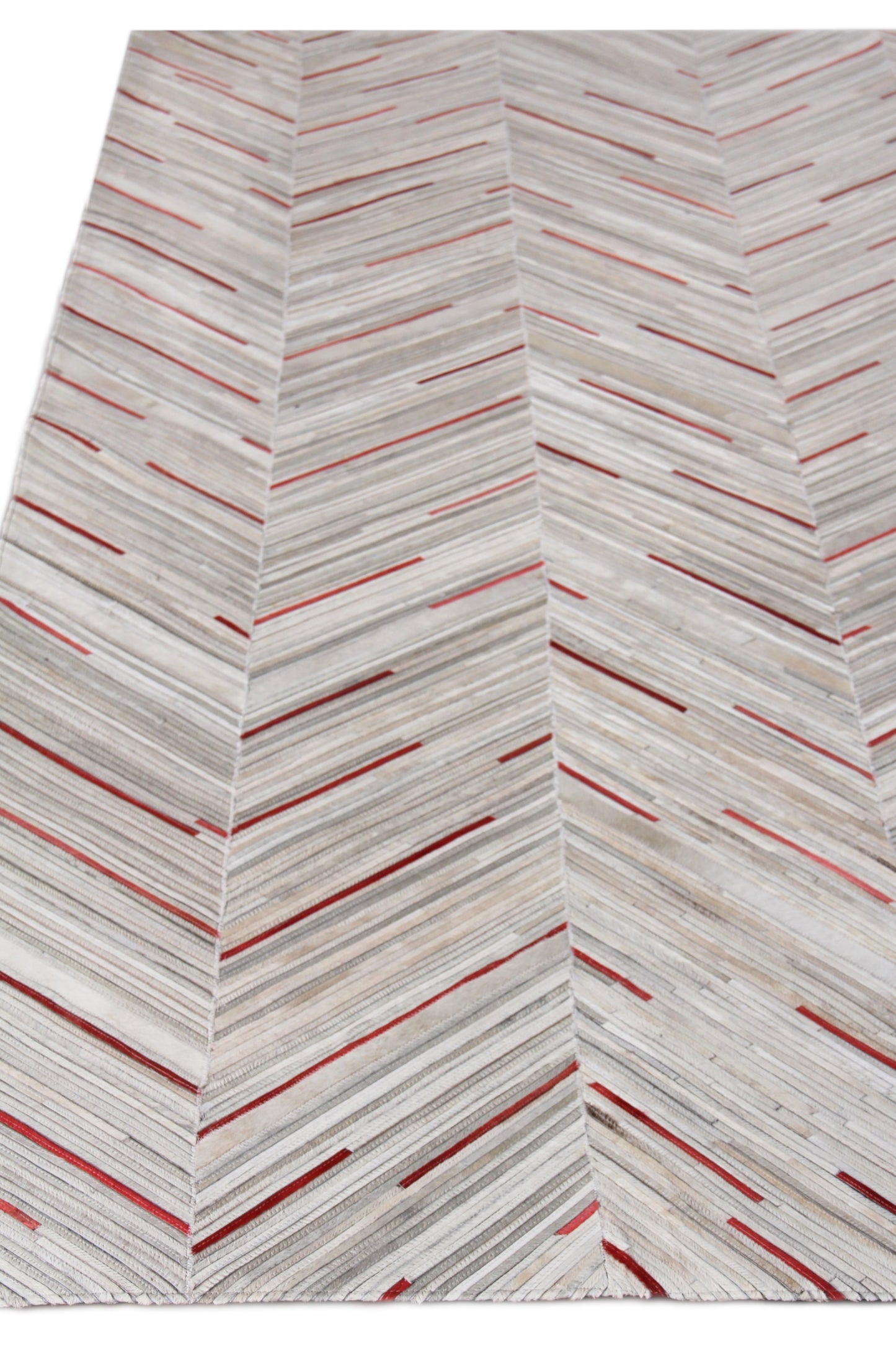 Light gray chevron rug with thin red lines; modern geometric rectangular area rug for living room.