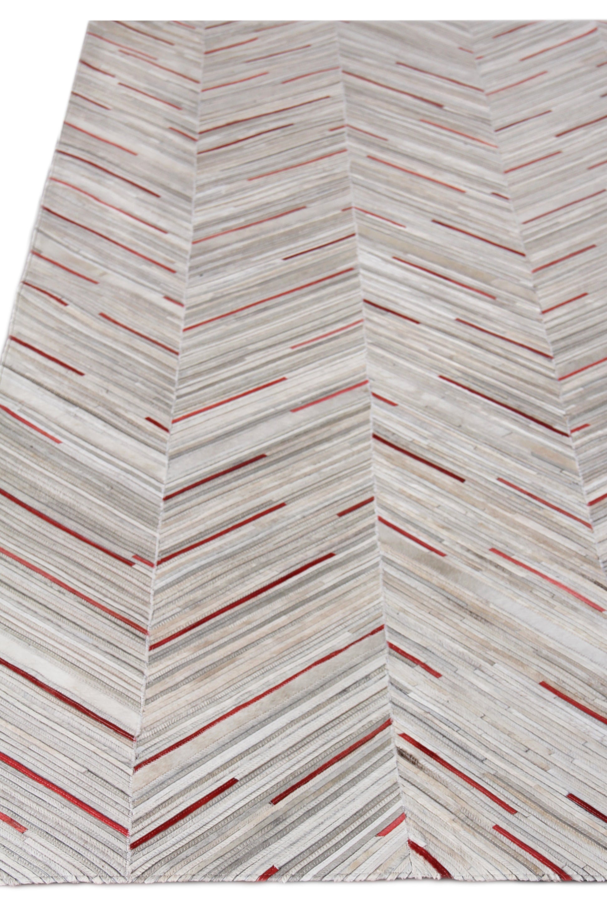 Light gray chevron rug with thin red lines; modern geometric rectangular area rug for living room.