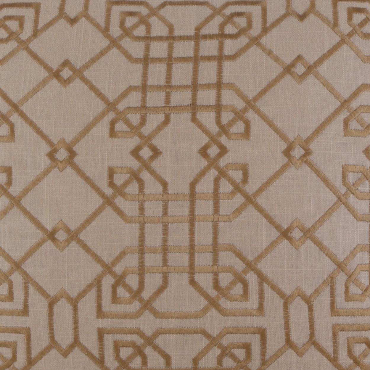 Beige fabric with tan geometric lattice pattern of interlocking squares and diamonds; chic upholstery textile.