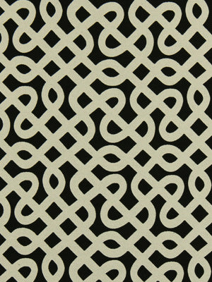 Cream-beige interlocking knot lattice on Ebony background; geometric upholstery fabric pattern.
