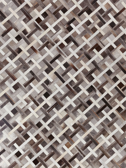 Basket-weave lattice pattern in beige, taupe, brown and gray; natural hide indoor hand-stitched rug.