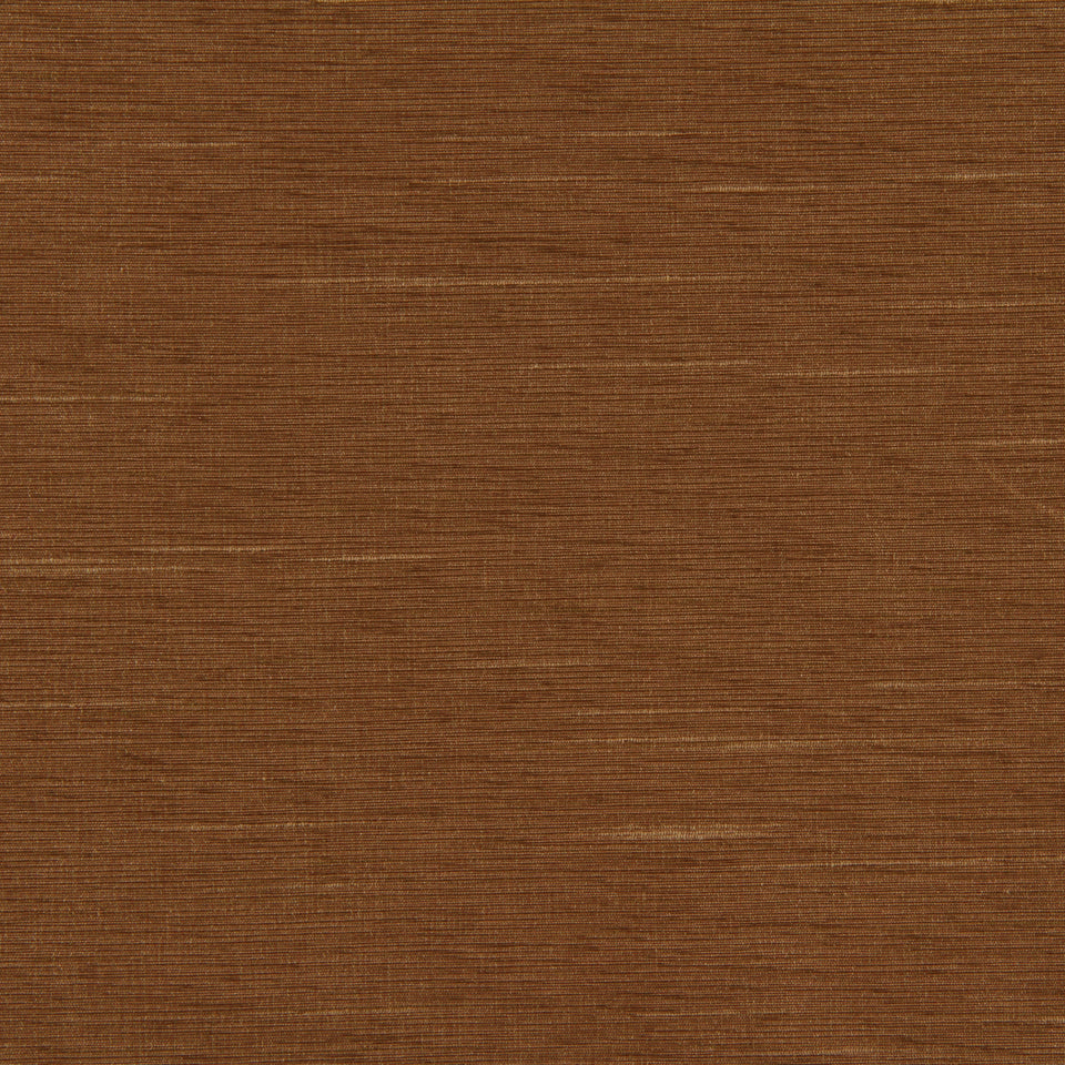 Close-up of tan fabric with a smooth finish and subtle plain-weave texture.