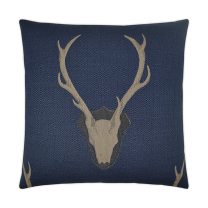 Navy blue knitted square pillow with beige deer skull and antler motif.