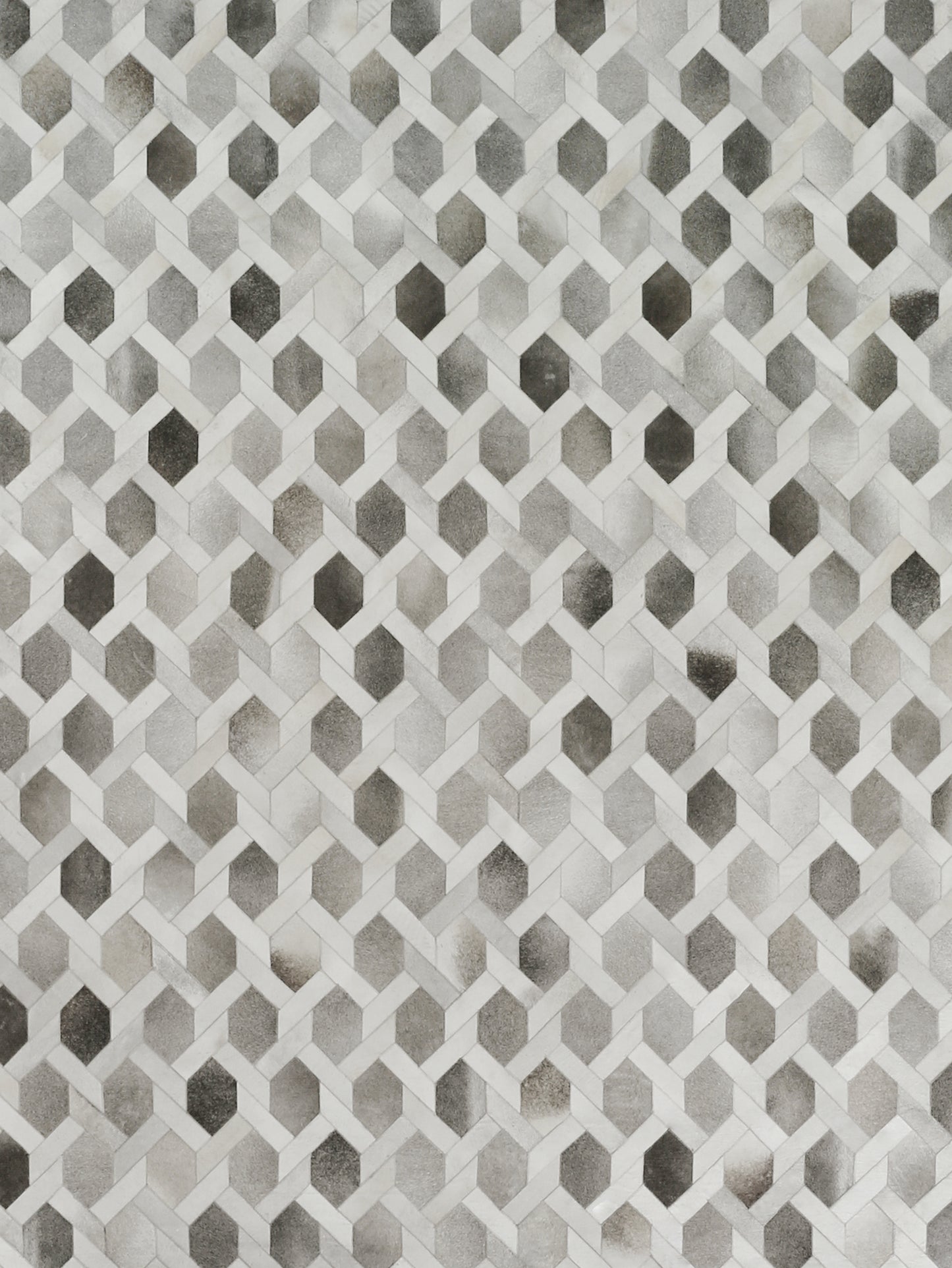 Natural hide indoor hand-stitched rug.