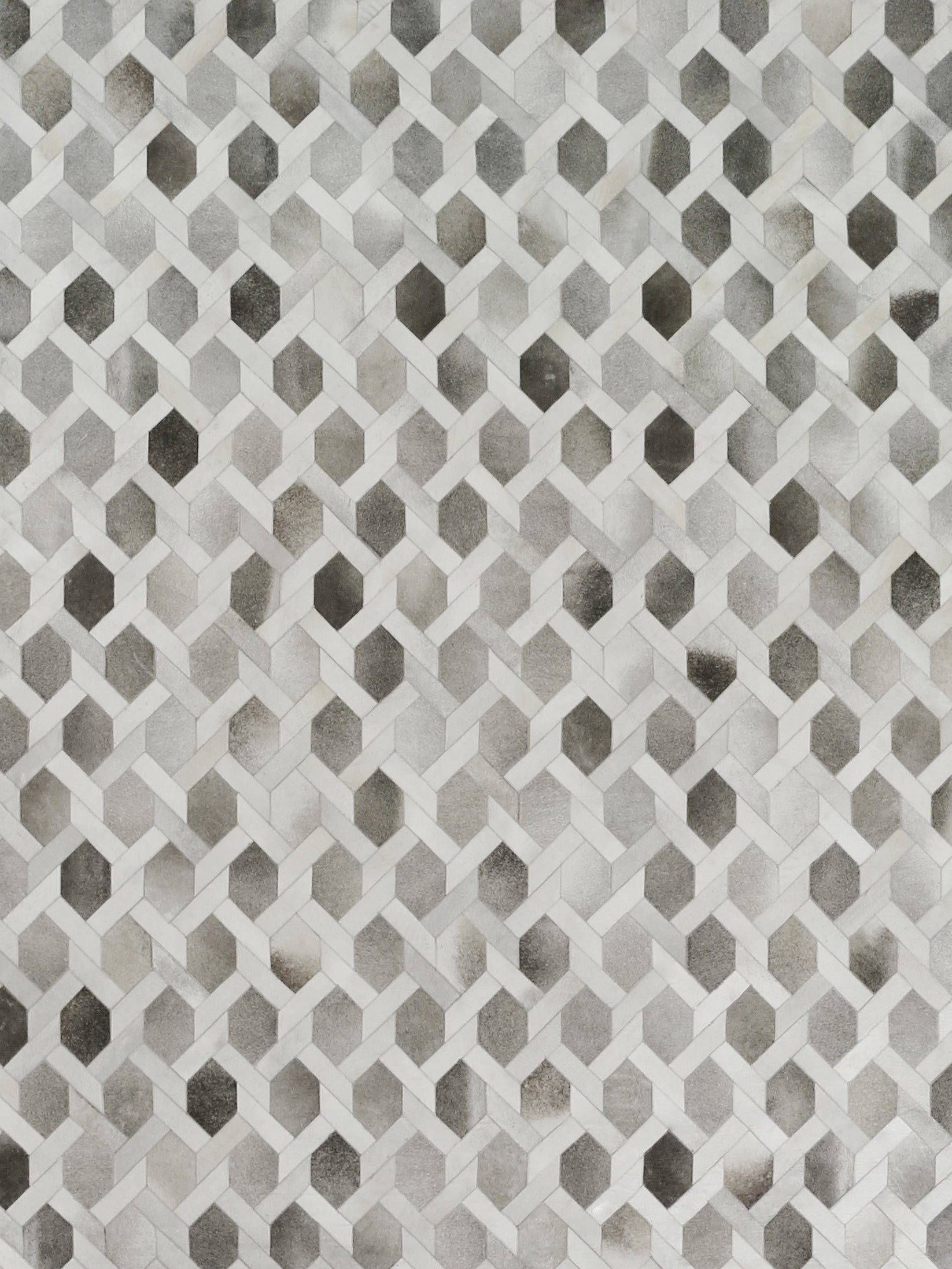 Natural hide indoor hand-stitched rug.