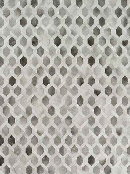 Natural hide indoor hand-stitched rug.