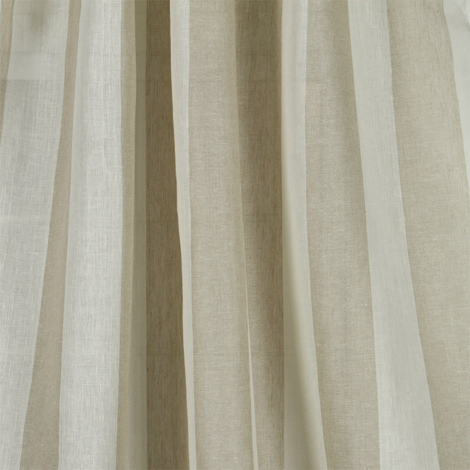 Beige sheer linen-like curtain fabric with soft vertical folds; light, airy drapery panel.
