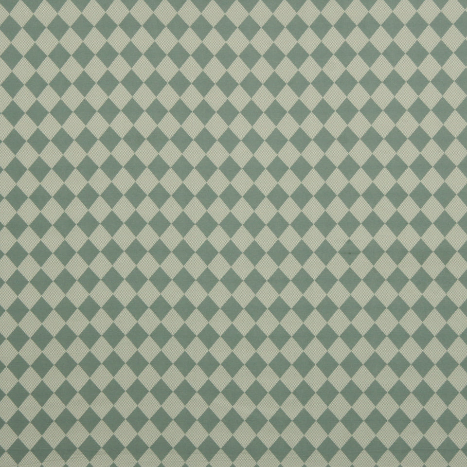 Teal and beige harlequin diamond pattern fabric for vintage geometric decor.