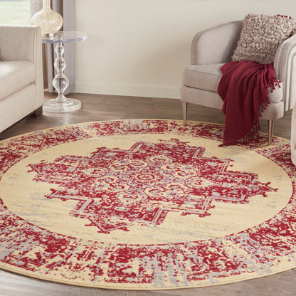 Round vintage-style oriental rug in cream with burgundy red medallion & light blue accents, soft pile for living room decor.