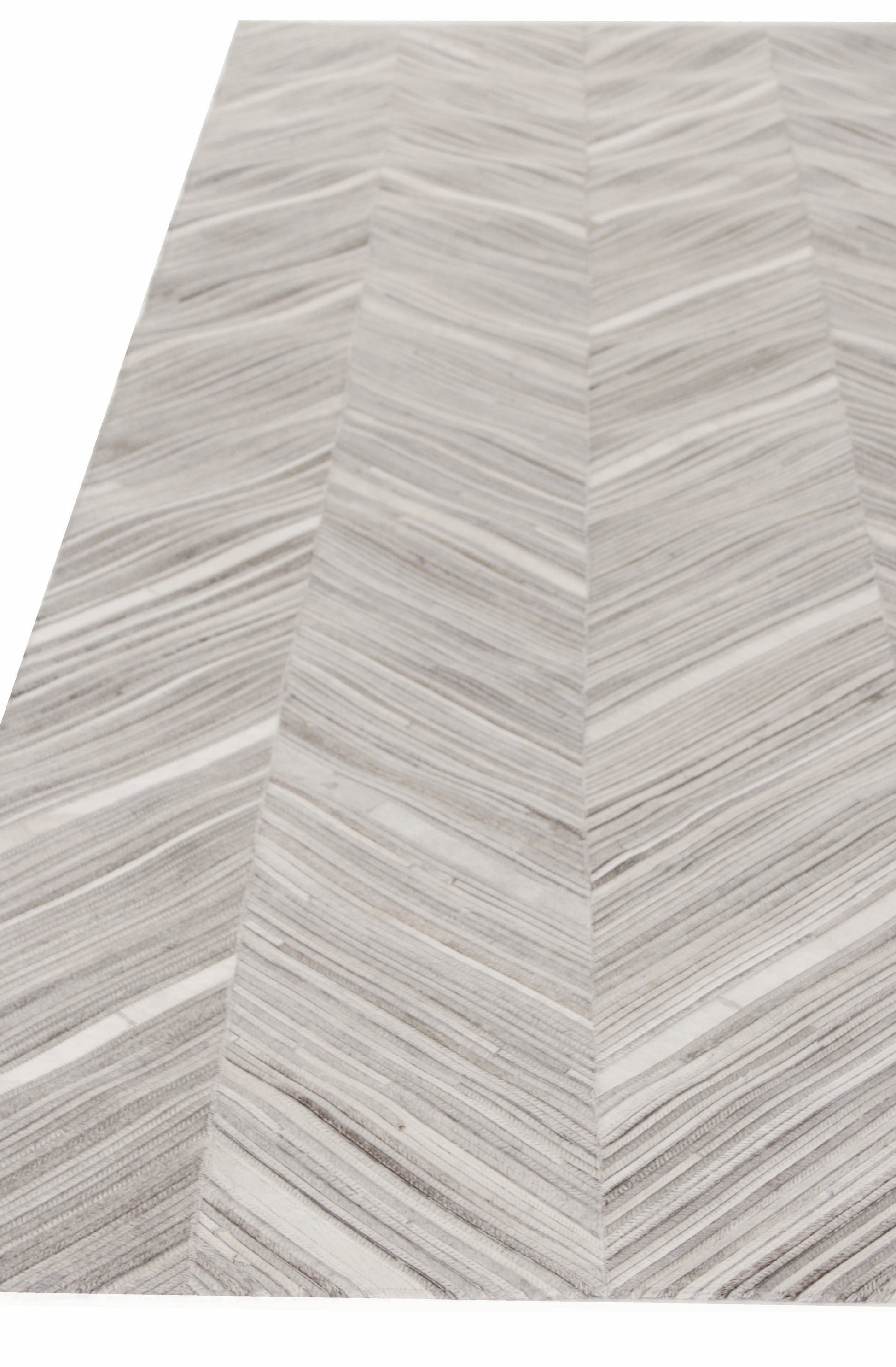 Light gray and white chevron rug with V-shaped stripe pattern and subtle texture.