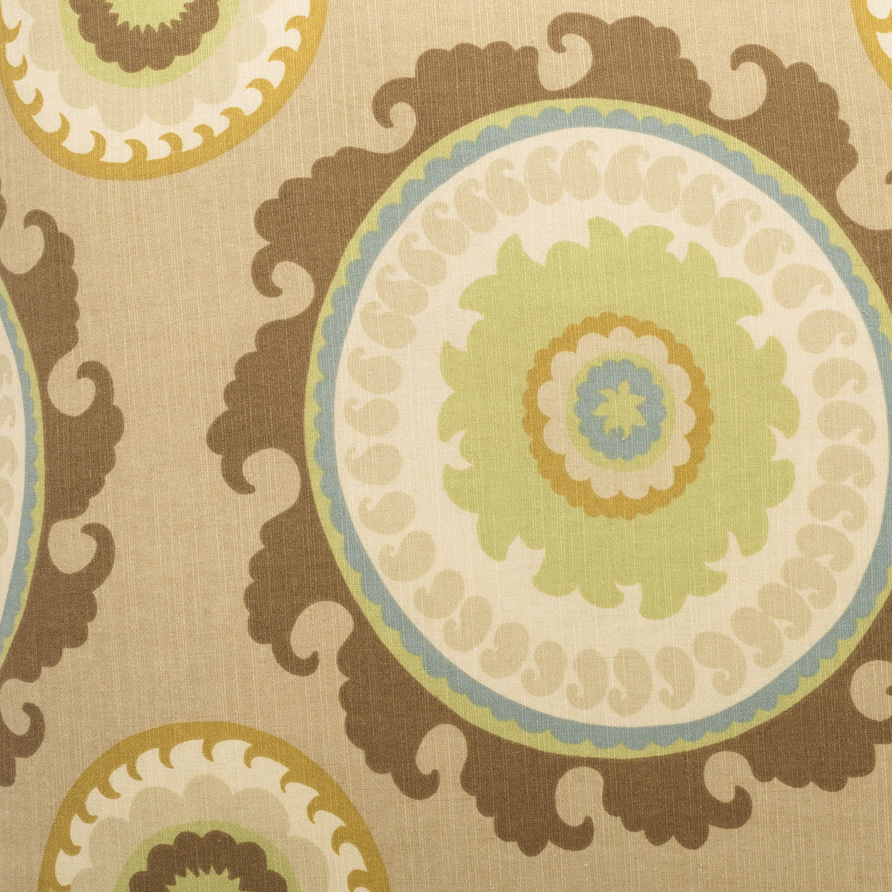 Linen-like fabric featuring large circular mandala patterns in tan, brown, olive, pale blue and cream.