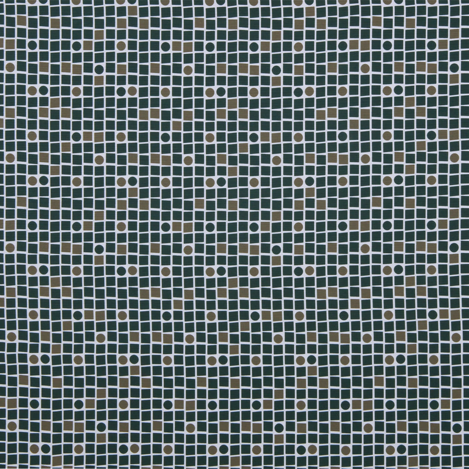 Close-up of dark teal square mosaic tiles with tiny beige dots in a tight grid.