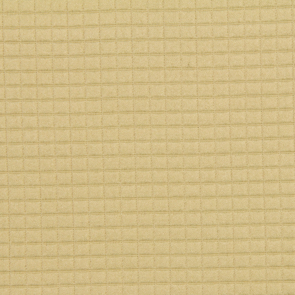 Beige kraft paper texture with a subtle square grid pattern, rustic box packaging.