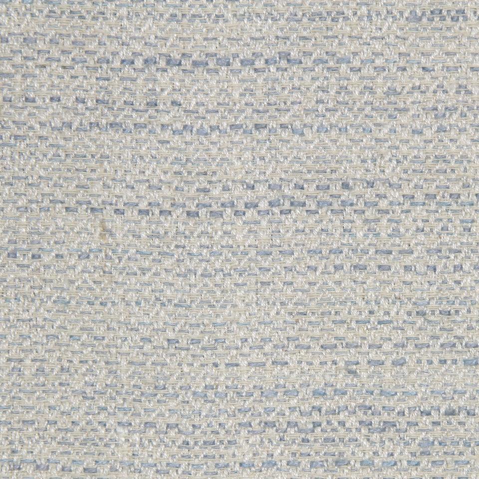 Beige tweed-style woven fabric with pale blue threads, subtle geometric pattern and textured surface.