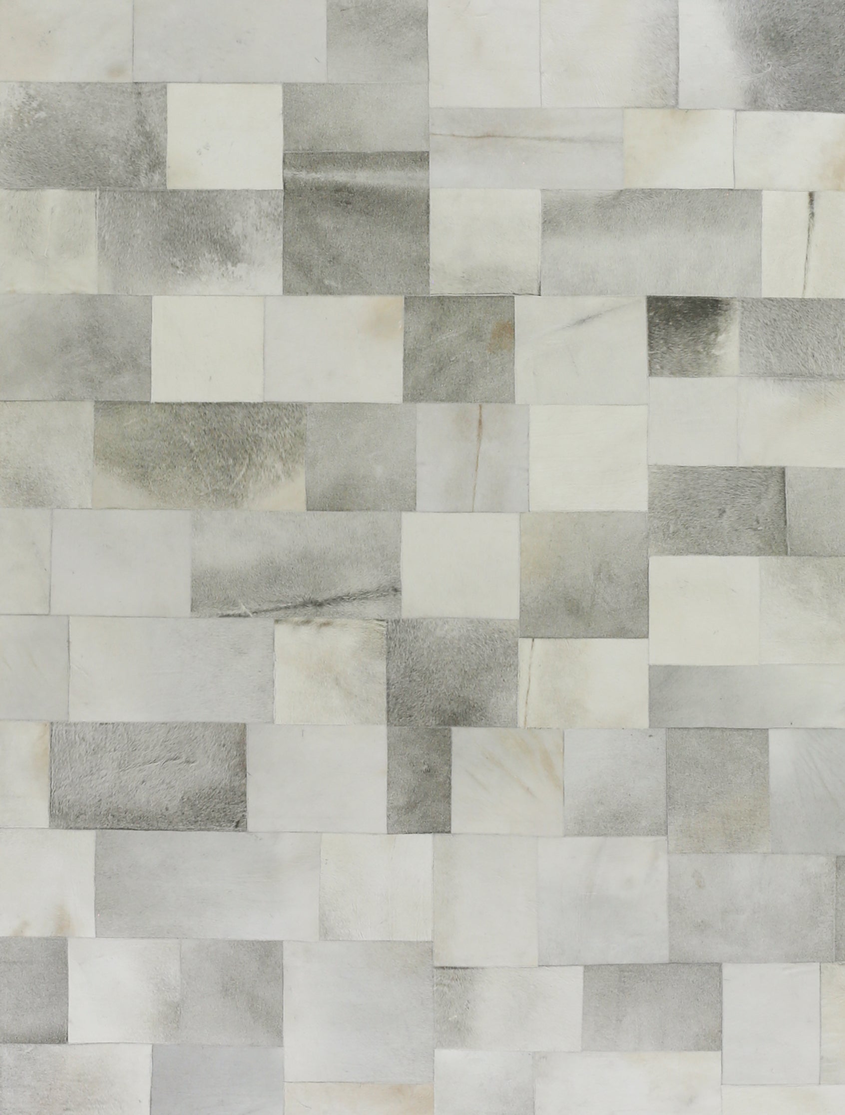 Natural hide indoor rug; hand-stitched; 5' x 8'.