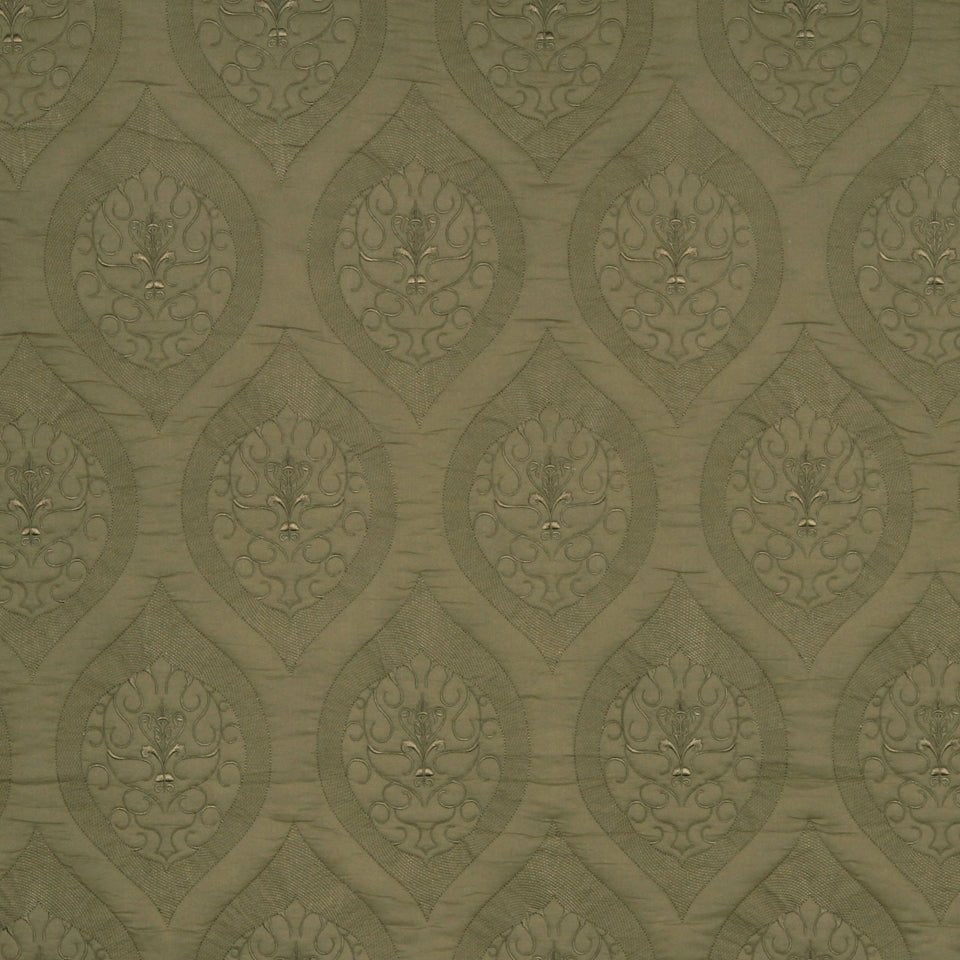 Olive green damask fabric with teardrop medallions and scrolling florals; textured vintage decorative pattern.