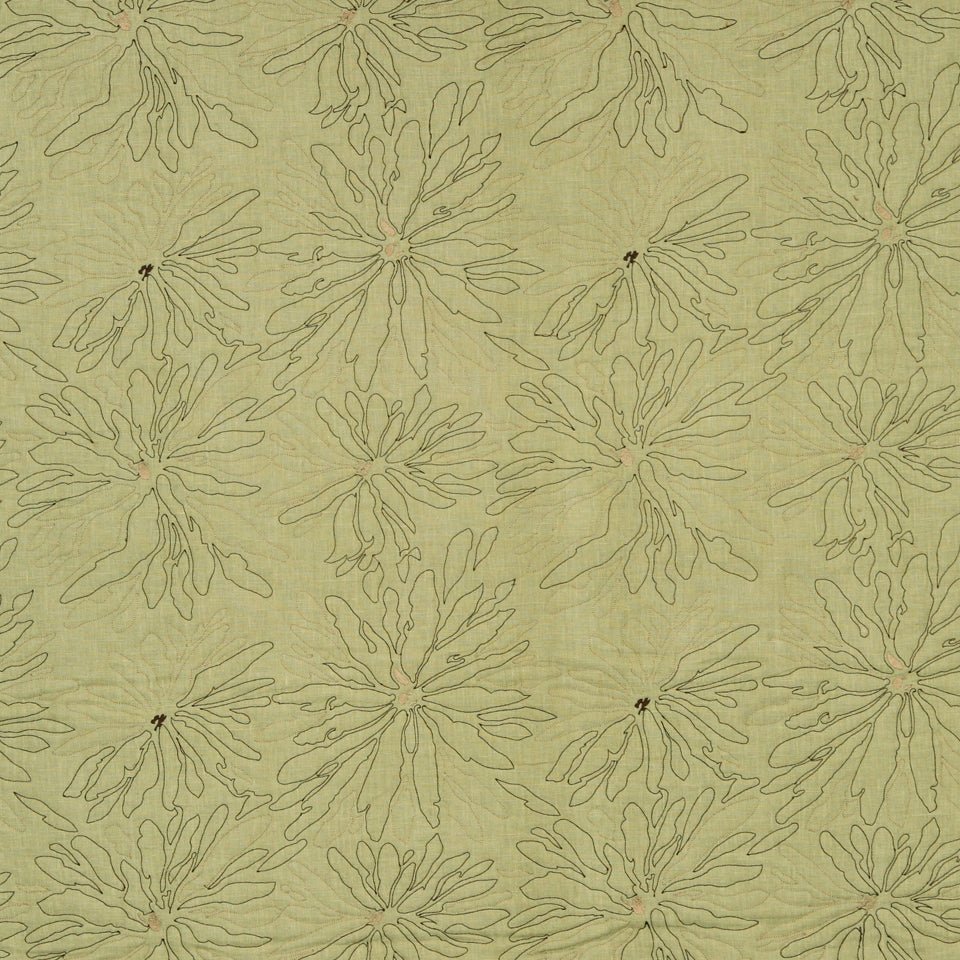 Olive-green fabric with repeating pale olive starburst floral motifs outlined in dark olive.