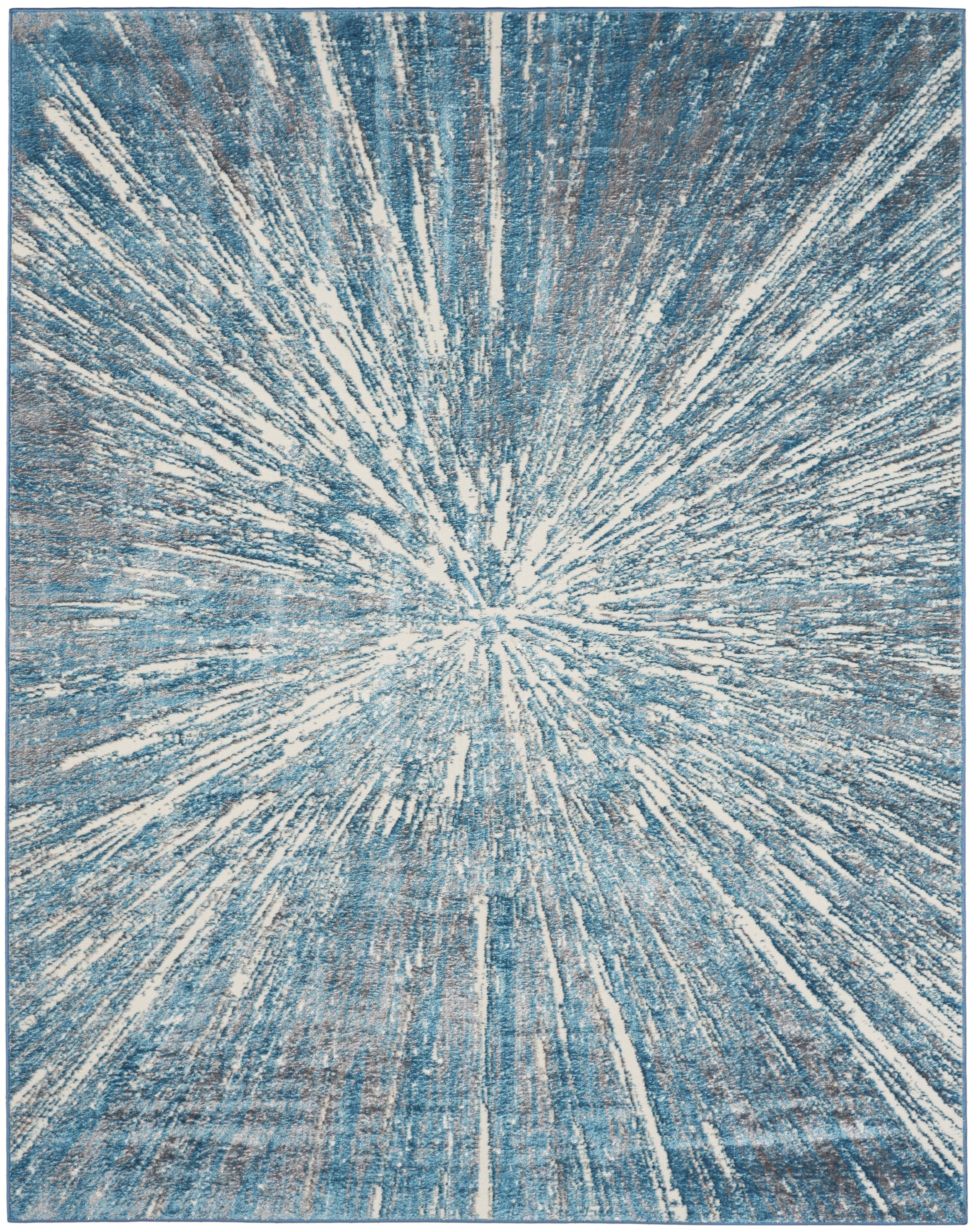 Blue and white rug with radiant starburst pattern, distressed texture and modern geometric style.