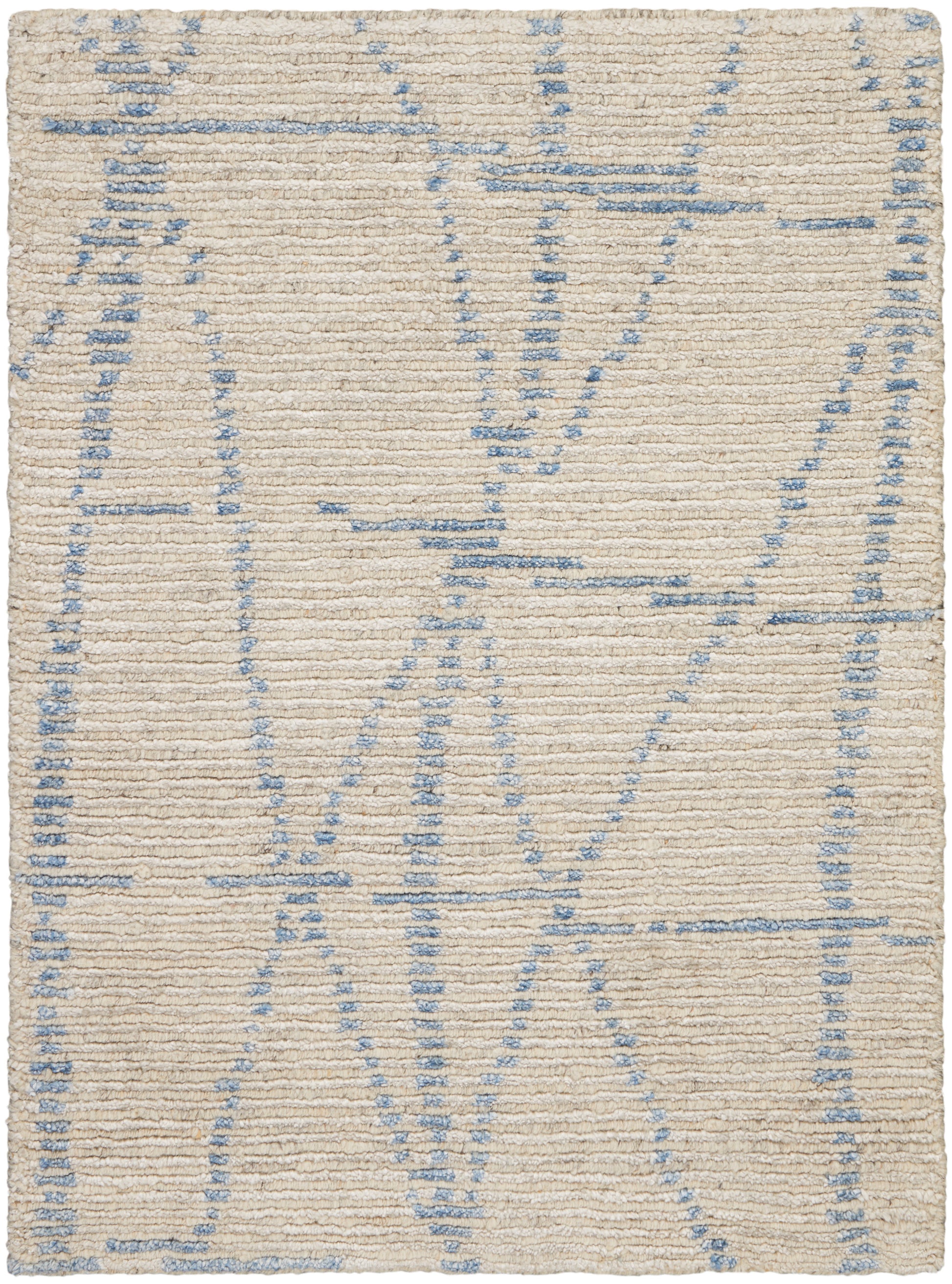 Beige woven rug with pale blue geometric lines in an abstract pattern; soft, textured surface.
