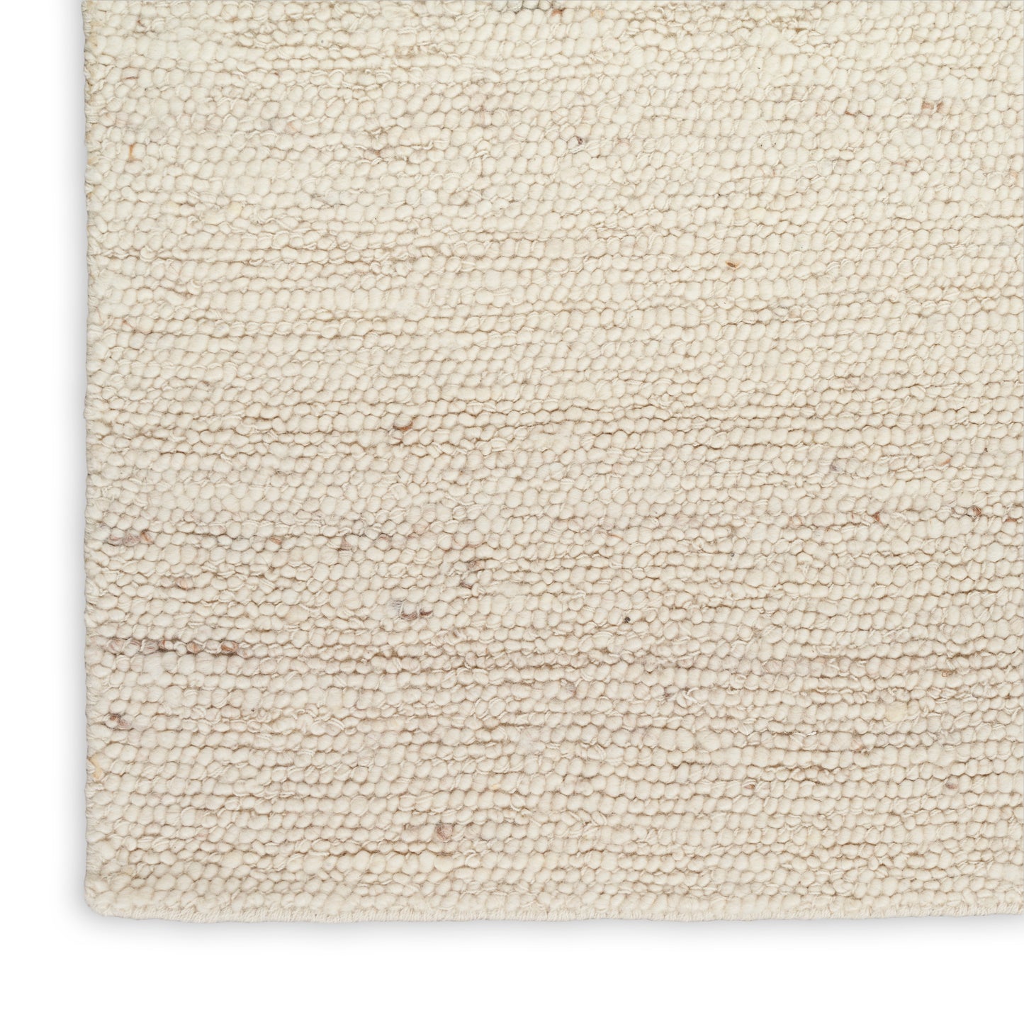 Cream boucle rug close-up: soft ivory beige loop pile with subtle specks; square-edge corner.