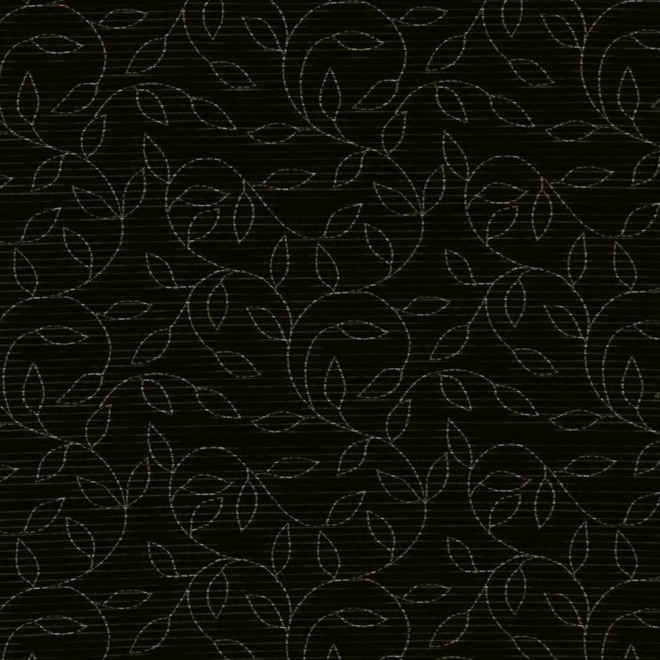 Dark charcoal fabric with a delicate light grey vine pattern of looping tendrils and leaves.