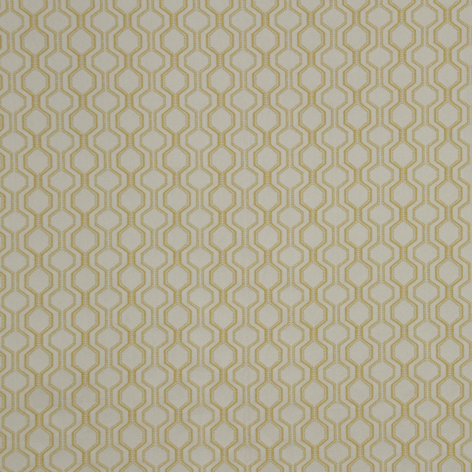 Beige upholstery fabric featuring a gold interlocking hexagon chain lattice pattern.