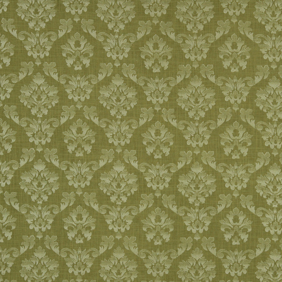 Olive green wispy woven fabric with repeating ornate floral motifs.