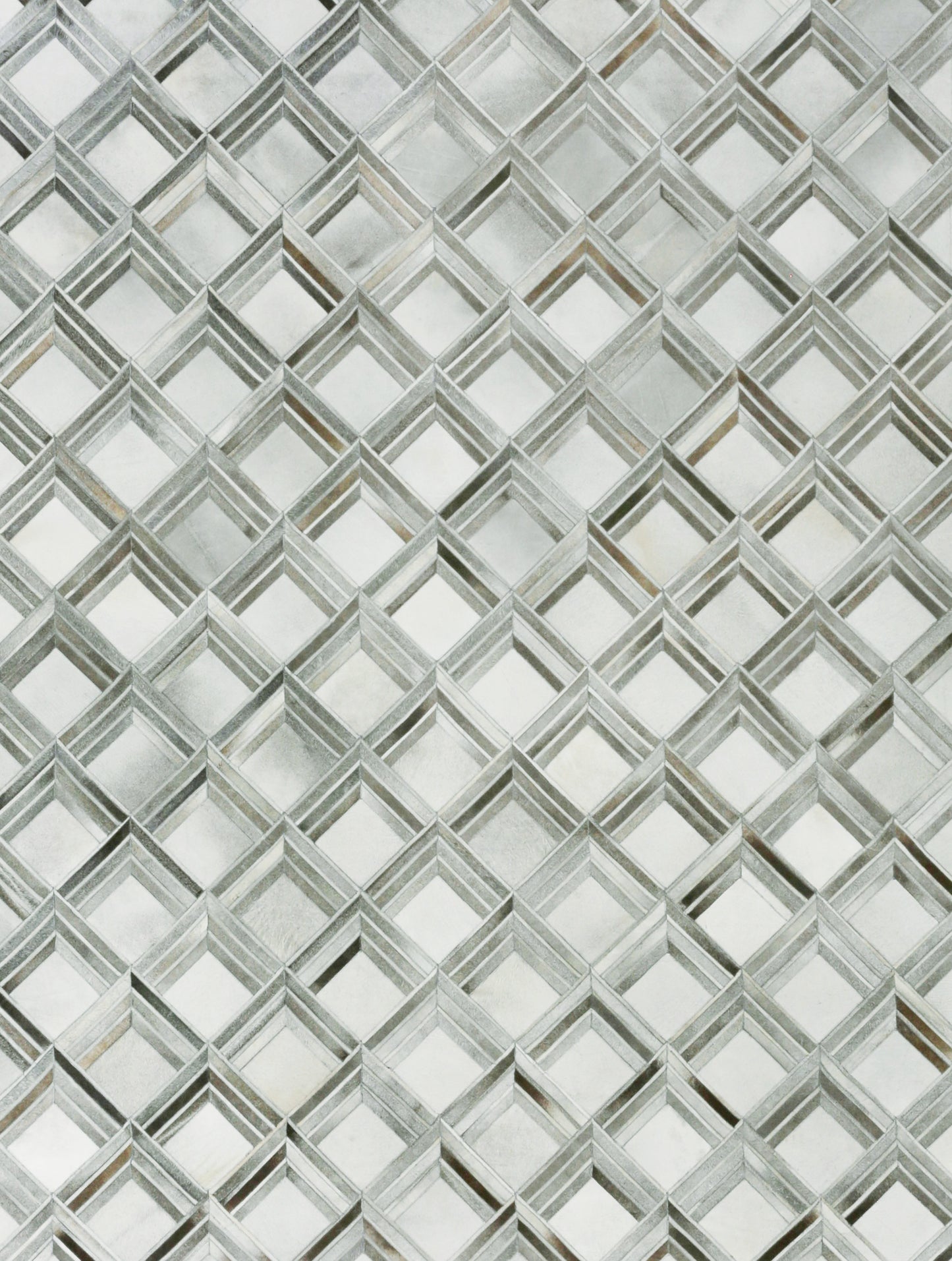 Natural hide indoor rug with hand-stitched detailing; 5' x 8'.