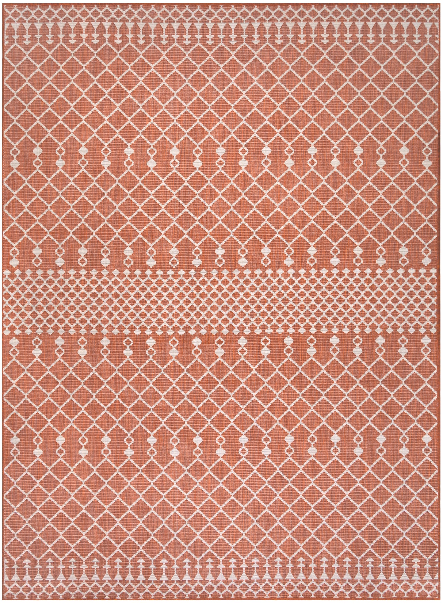 Terracotta rectangular rug with white geometric lattice diamonds and dotted borders; boho Moroccan-inspired living room rug.
