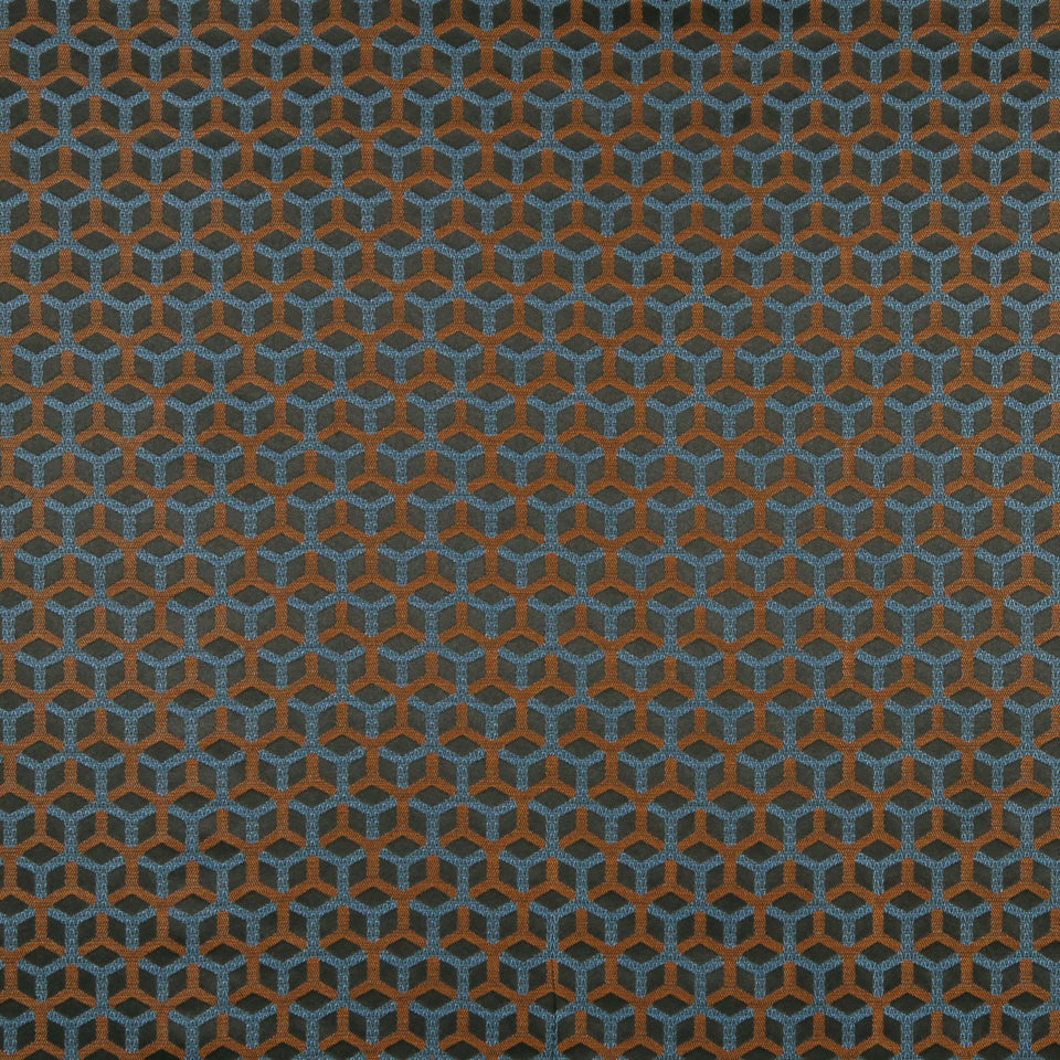 Hexagon geometric pattern in orange-brown and teal blue on a textile or wallpaper style texture.