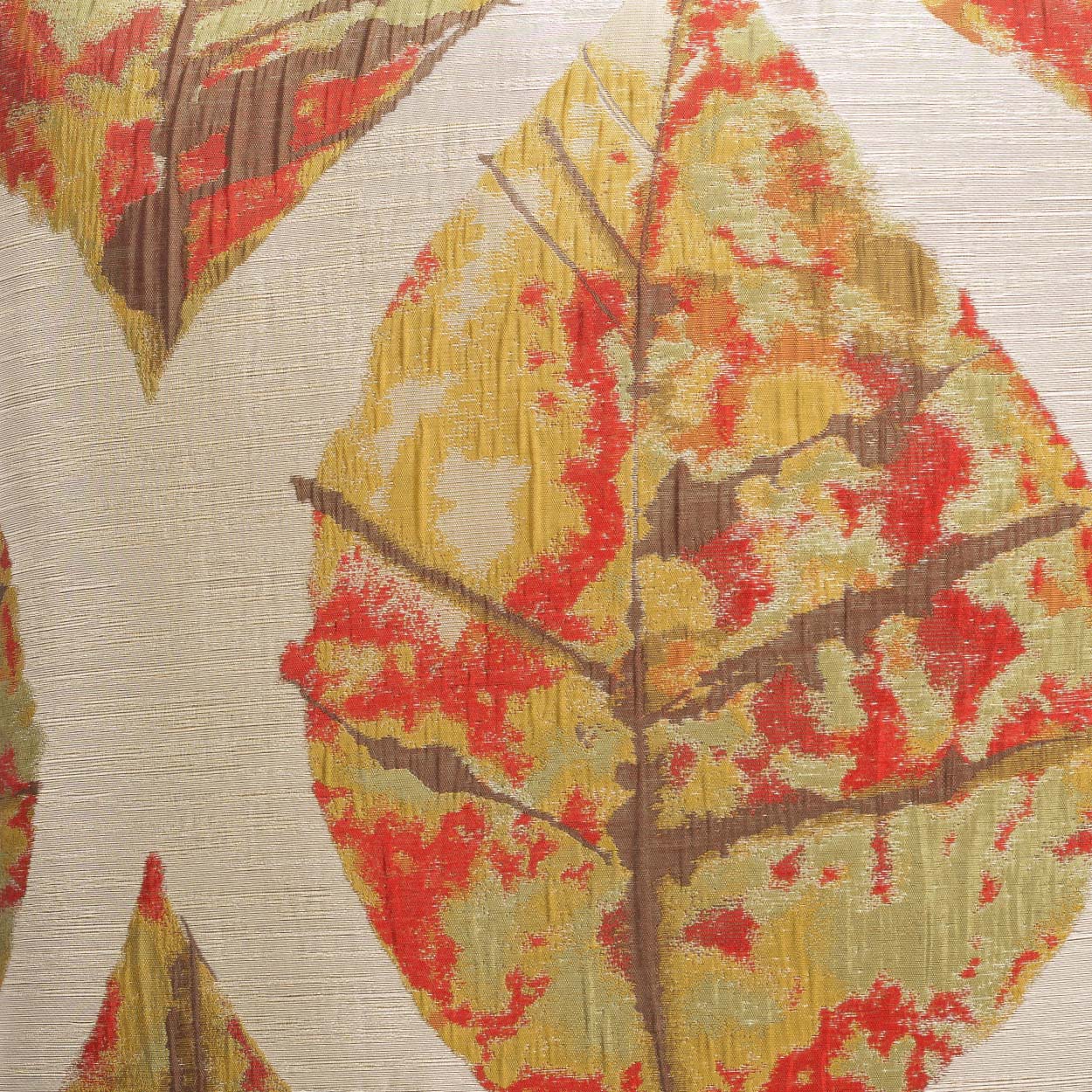 Autumn leaf print fabric; beige background with red, yellow, orange leaves and subtle texture.