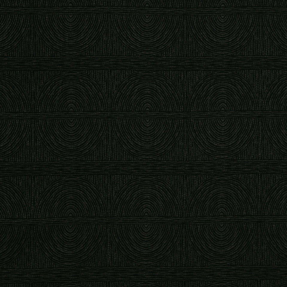 Dark green textured upholstery fabric featuring embossed concentric circles in horizontal rows.