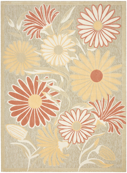 Beige floral area rug with large red, yellow and cream daisies and tan border.