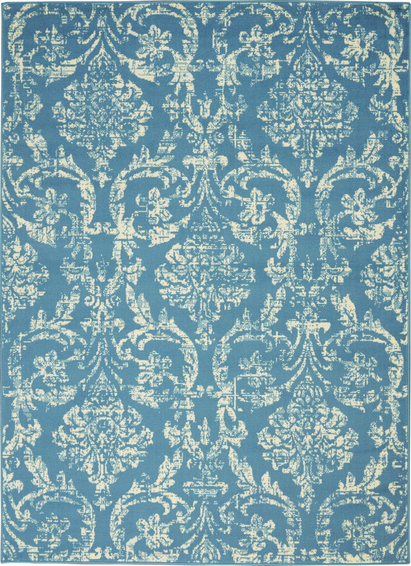 Blue rug with cream ornate damask pattern, woven texture, decorative home decor.