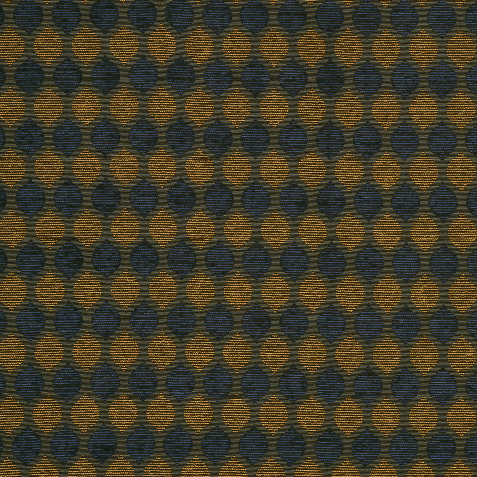 Textured jacquard fabric featuring alternating orange and navy circular motifs in a diagonal lattice.