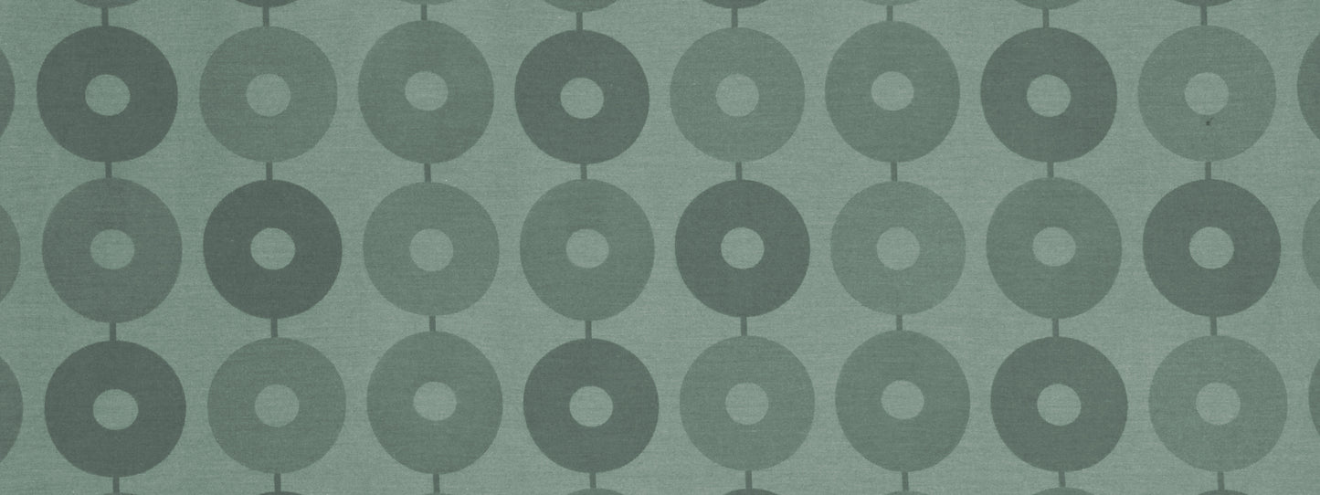Mint green fabric with a repeating grey interlinked ring pattern; geometric donut shapes for wallpaper or upholstery.