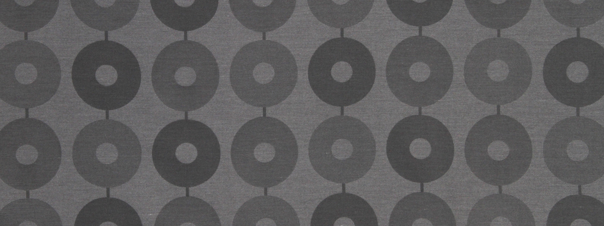 Repeating gray concentric circle pattern with hollow centers in a grid; modern textured wallpaper or fabric.